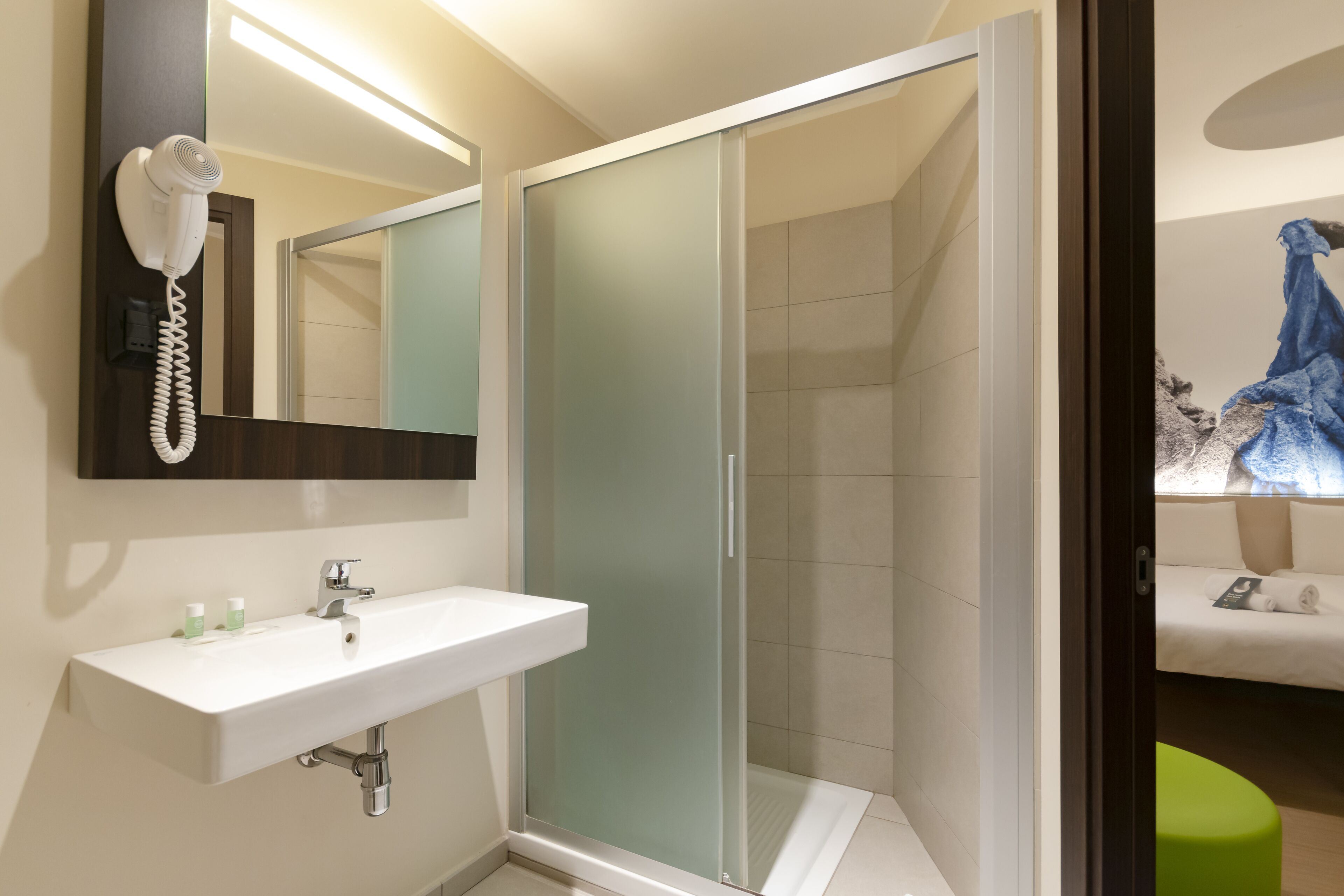 economy twin room, non smoking, no windows | bathroom | shower, free toiletries, hair dryer, towels