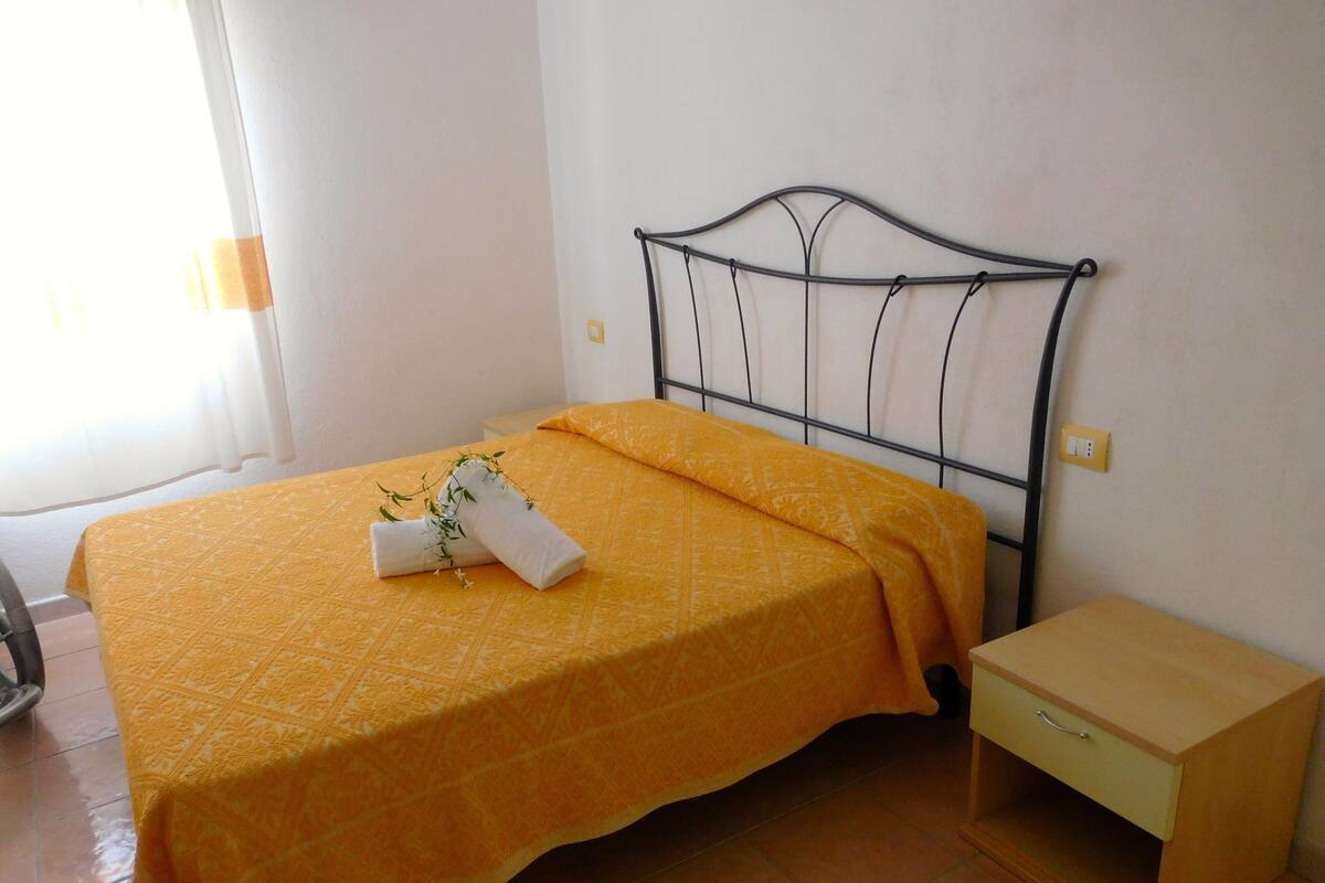 Family Apartment, 1 Bedroom | 1 bedroom, cribs (free), WiFi (free), bed sheets