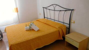 Apartamento famĂlia, 1 quarto | 1 quarto, berços grĂĄtis, Wi-Fi de cortesia, roupa de cama