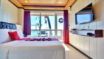 Deluxe with Sea View (Beachfront) | Minibar, in-room safe, blackout curtains, free WiFi