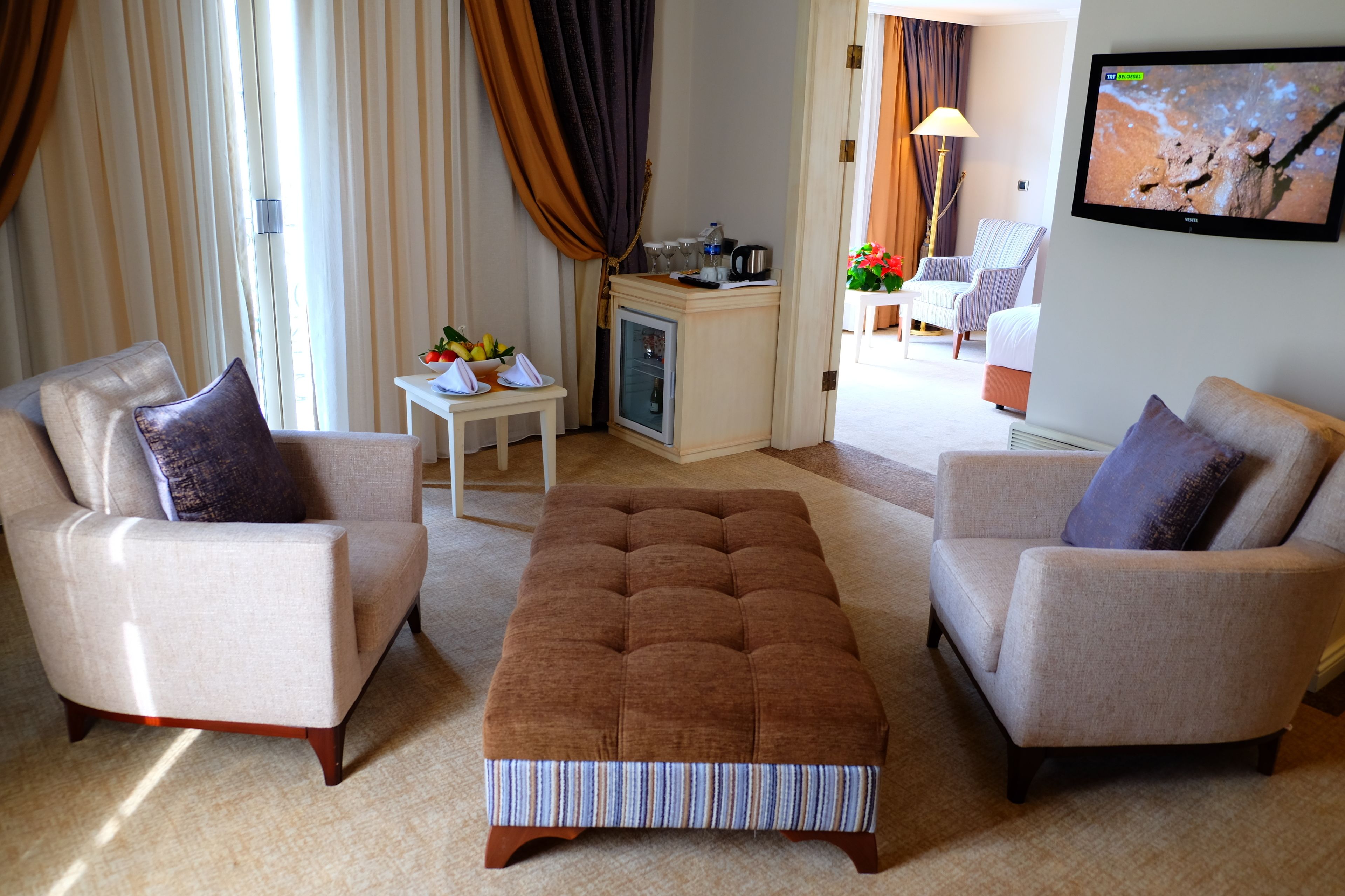 suite | living area | 82-cm lcd tv with satellite channels, tv