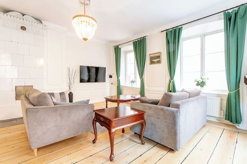 Grand Apartment, 1 Bedroom | Living area | Flat-screen TV