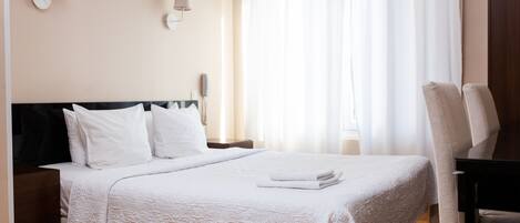 In-room safe, desk, blackout curtains, iron/ironing board