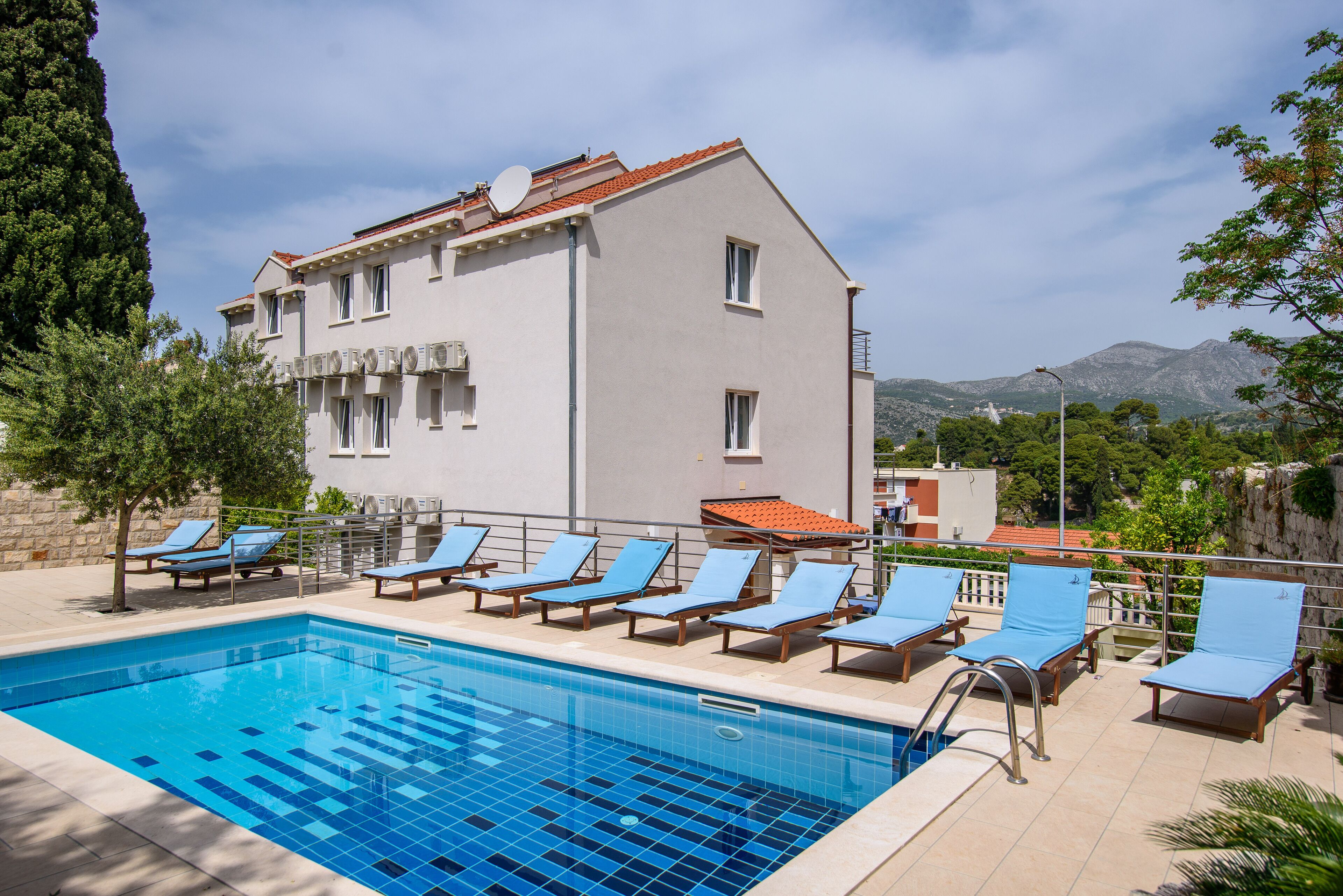 Outdoor pool, open 9:00 AM to 10:00 PM, sun loungers