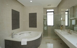 Presidential Villa | Bathroom | Separate tub and shower, slippers, towels - President Hotel (Lilongwe)
