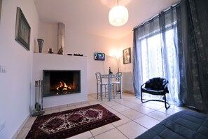 Superior Double Room | Living area | Flat-screen TV