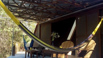 Cabin, 1 King size bed, with partial ocean view (Room 60 degrees) | Terrace/patio
