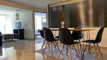 Exclusive Apartment | Living area | 32-inch flat-screen TV with cable channels, TV