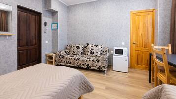 In-room safe, desk, laptop workspace, blackout curtains