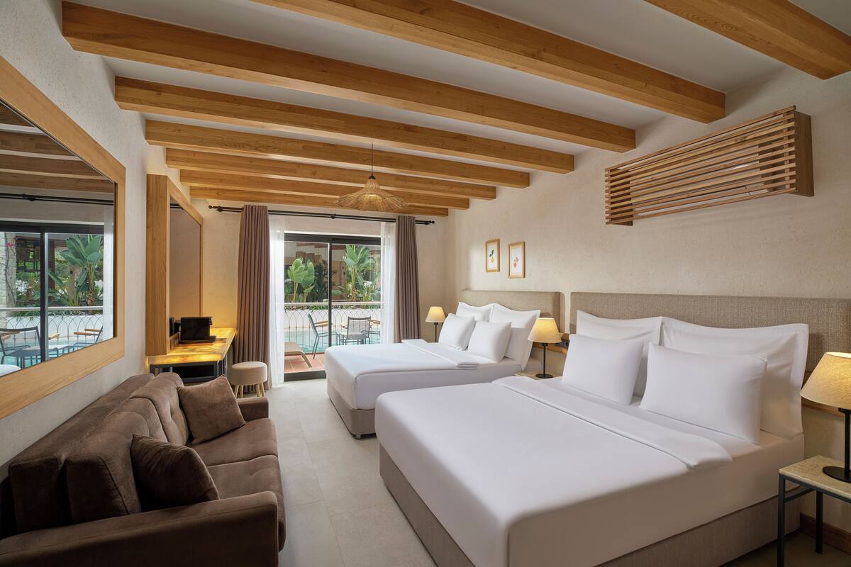 double room, pool access | premium bedding, in-room safe, soundproofing, iron/ironing board