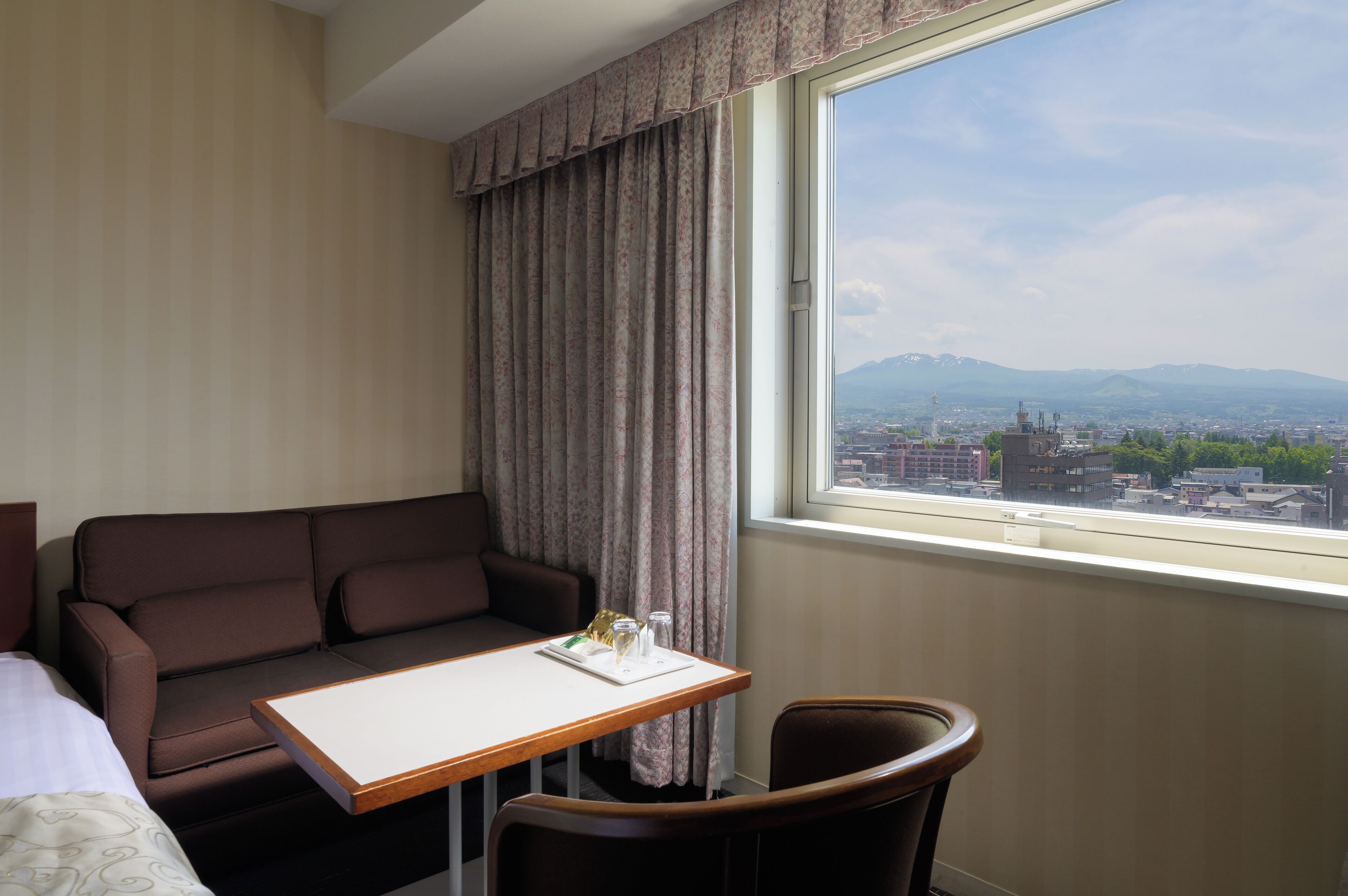 standard twin room, non smoking, mountain view | 1 bedroom, desk, laptop workspace, blackout curtains