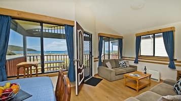 Comfort Villa, 2 Bedrooms, Ocean View, Oceanfront | Living room | 32-inch flat-screen TV with digital channels, TV