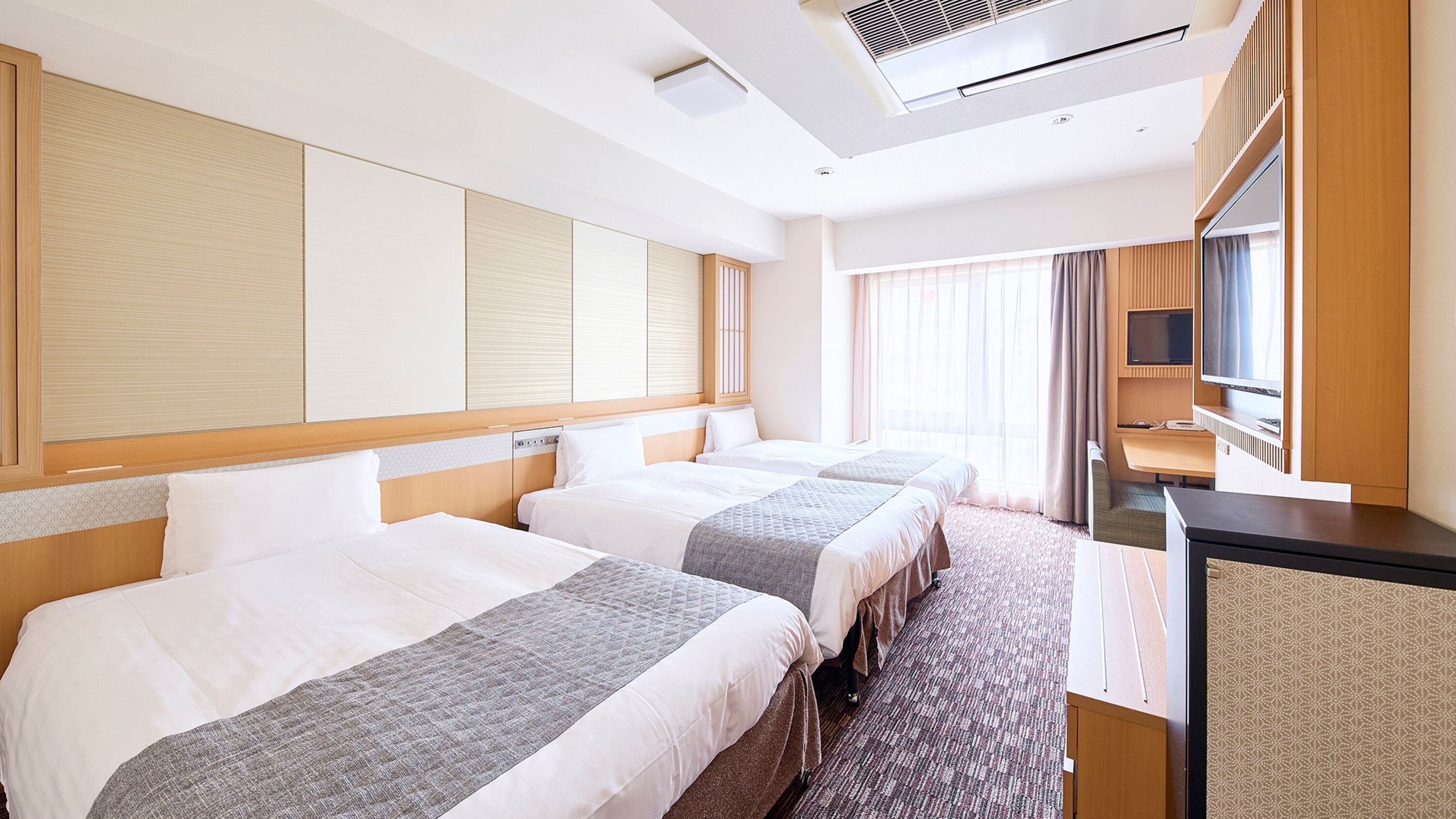 Premium bedding, down duvets, desk, laptop workspace