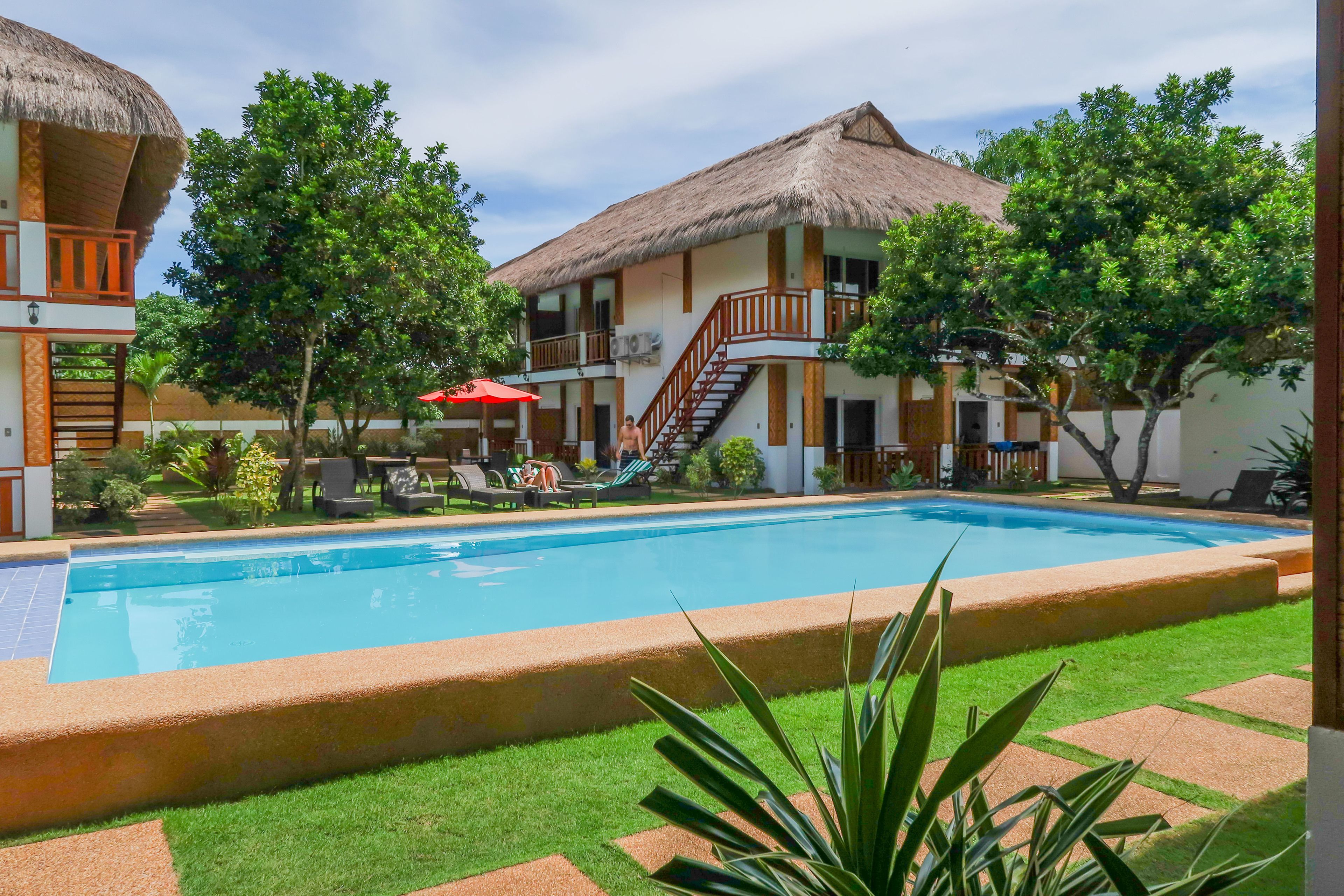 2 outdoor pools, pool umbrellas, sun loungers