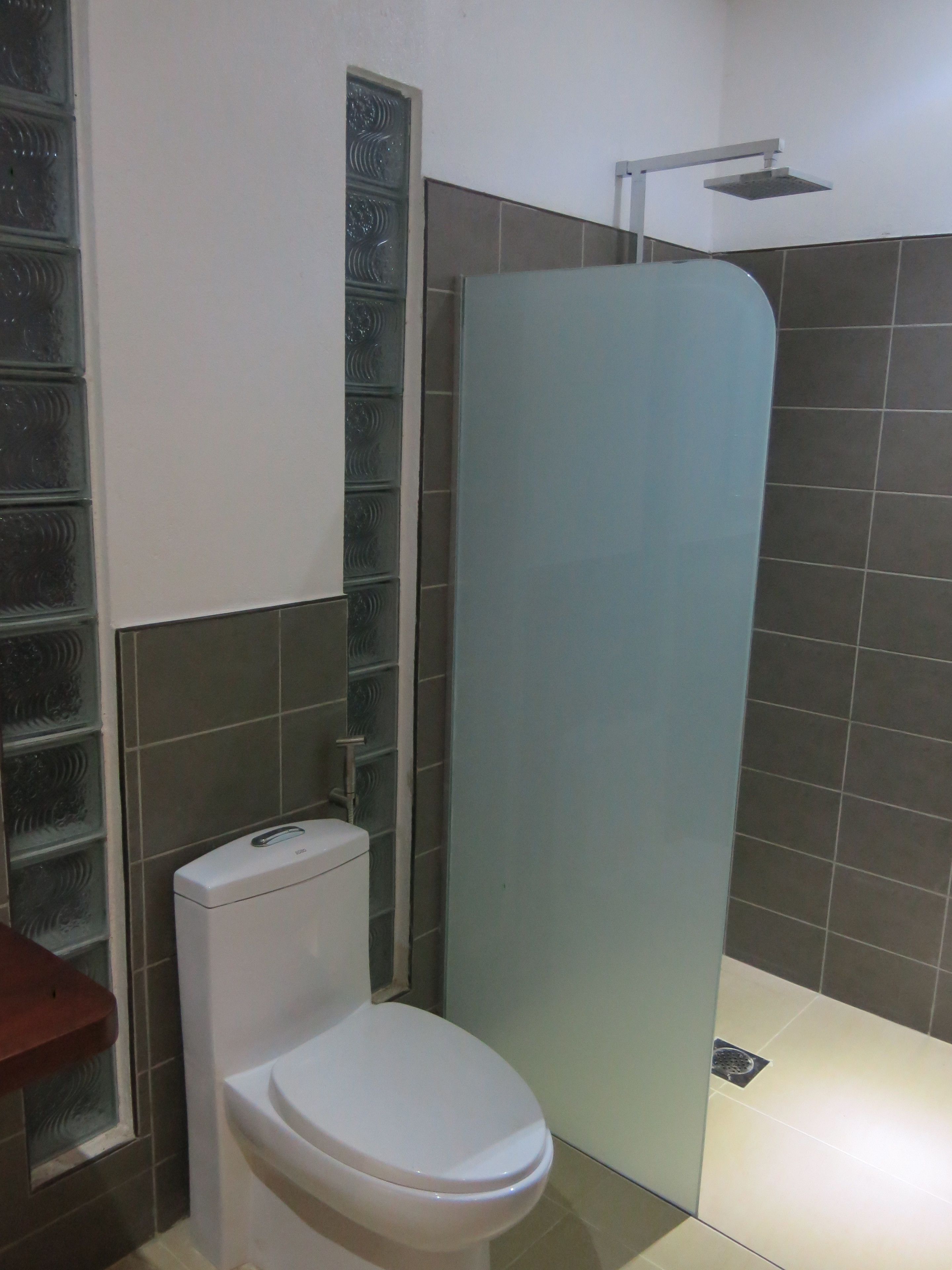 superior room | bathroom | shower, rainfall showerhead, free toiletries, hair dryer