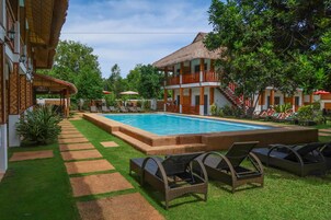 2 outdoor pools, pool umbrellas, pool loungers