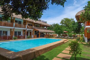 2 outdoor pools, pool umbrellas, pool loungers