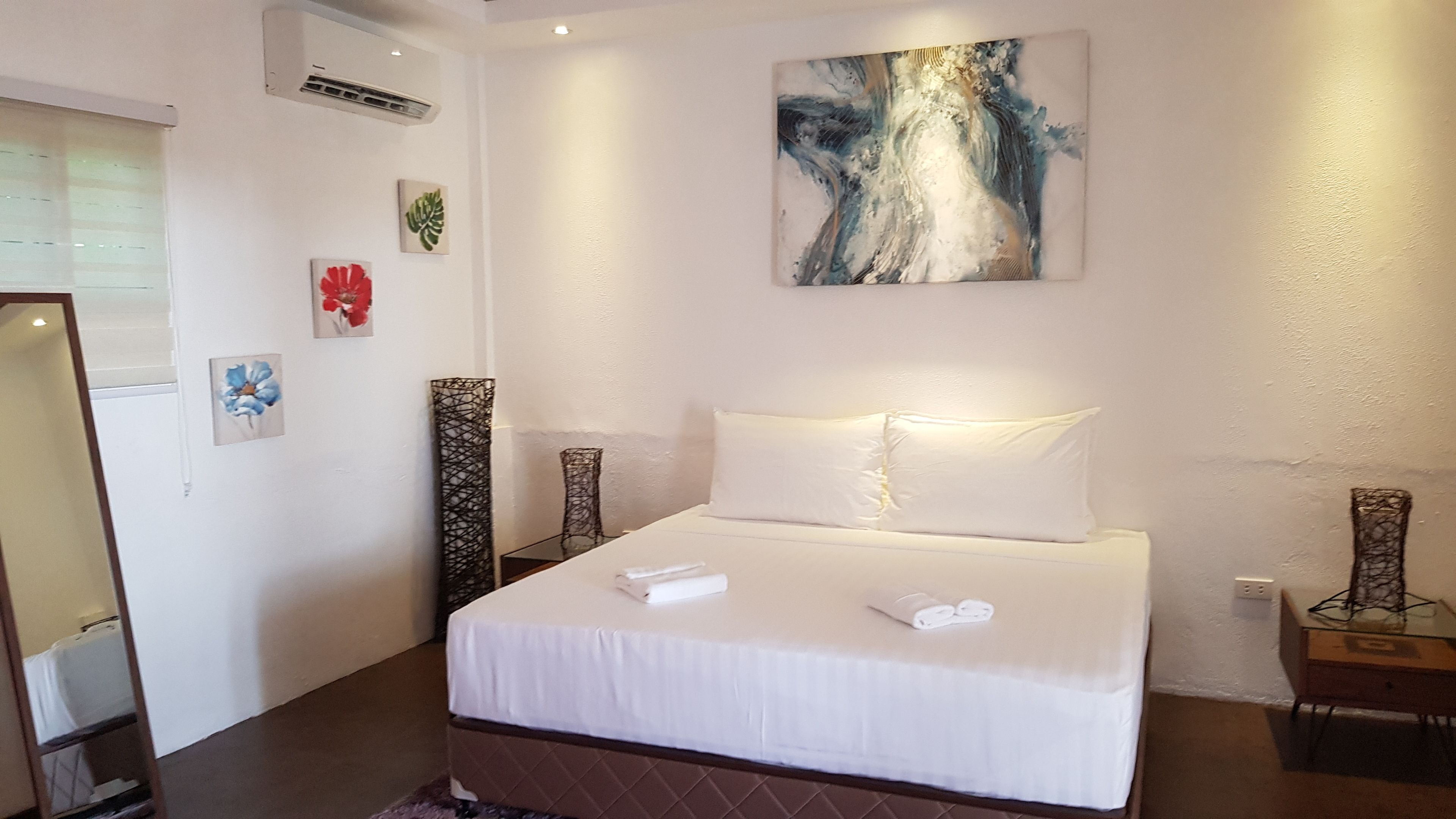 deluxe suite, 2 bedrooms, pool view | premium bedding, down duvets, memory-foam beds, minibar
