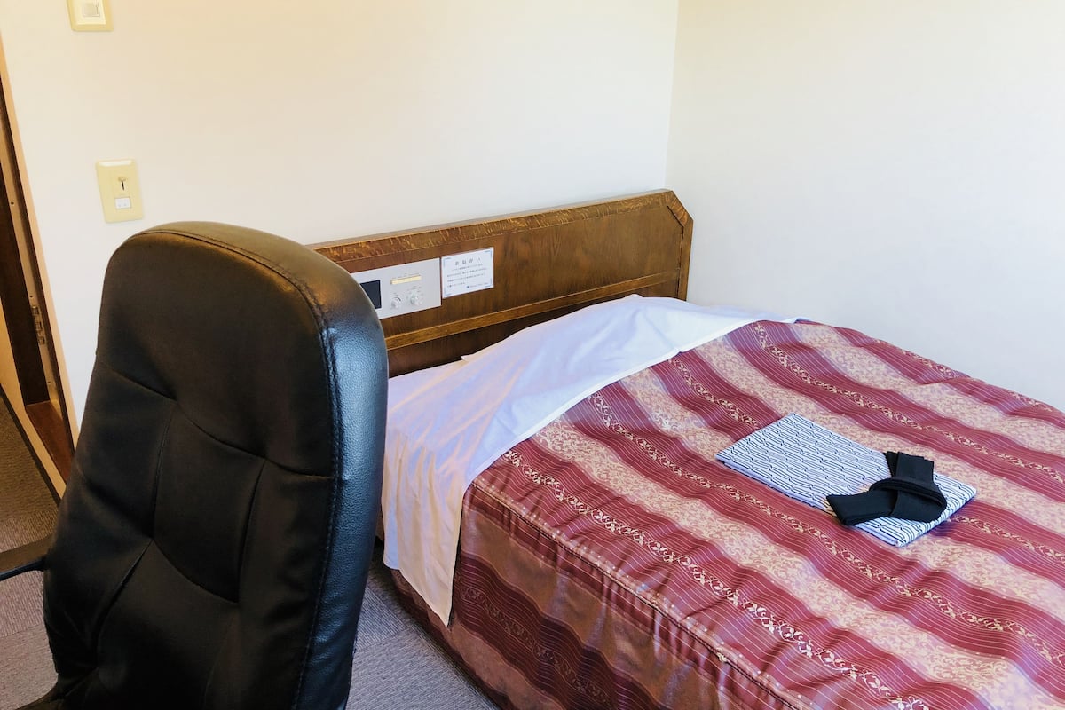 blackout curtains, iron/ironing board, free wifi, bed sheets