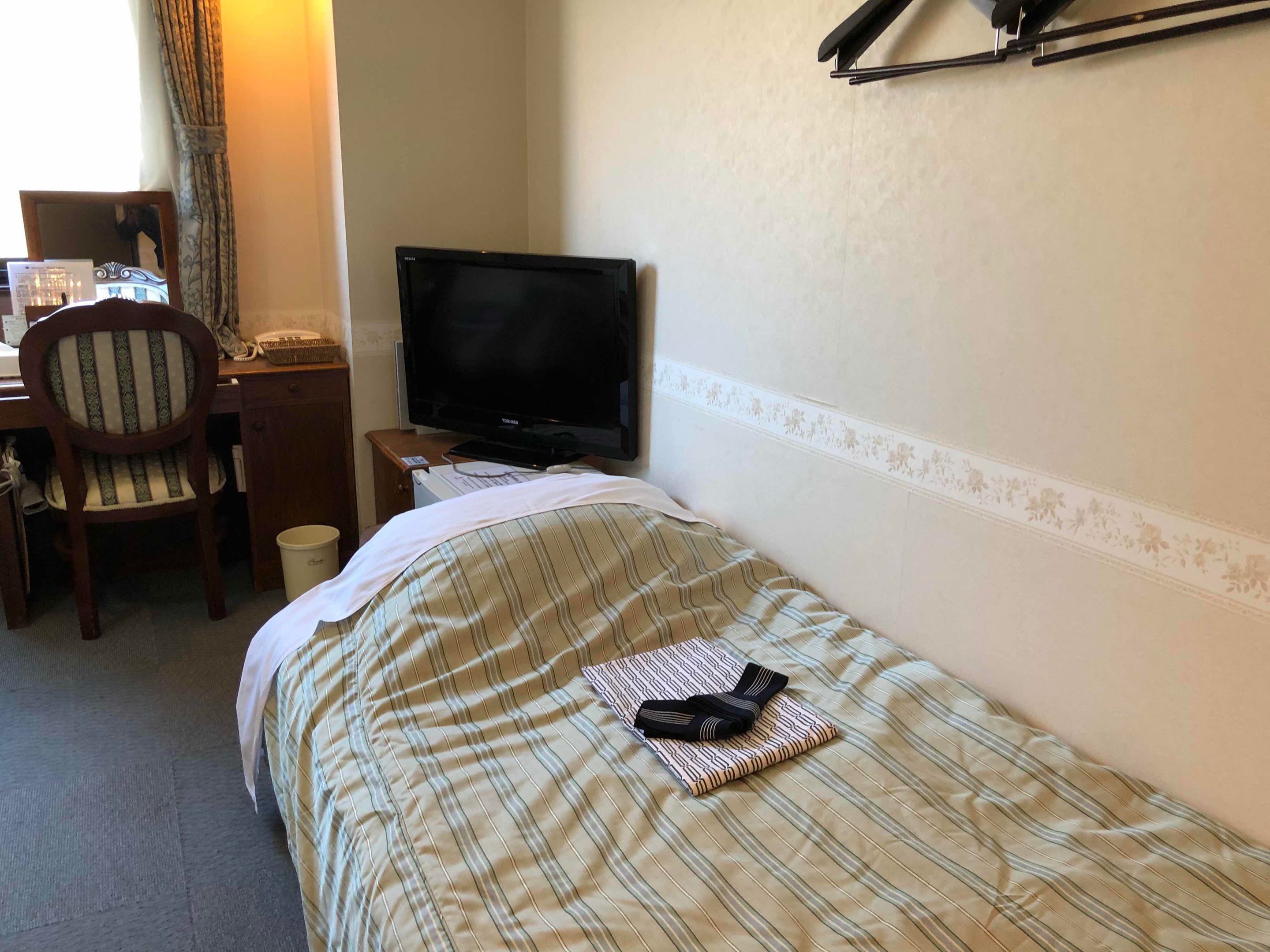 blackout curtains, iron/ironing board, free wifi, bed sheets