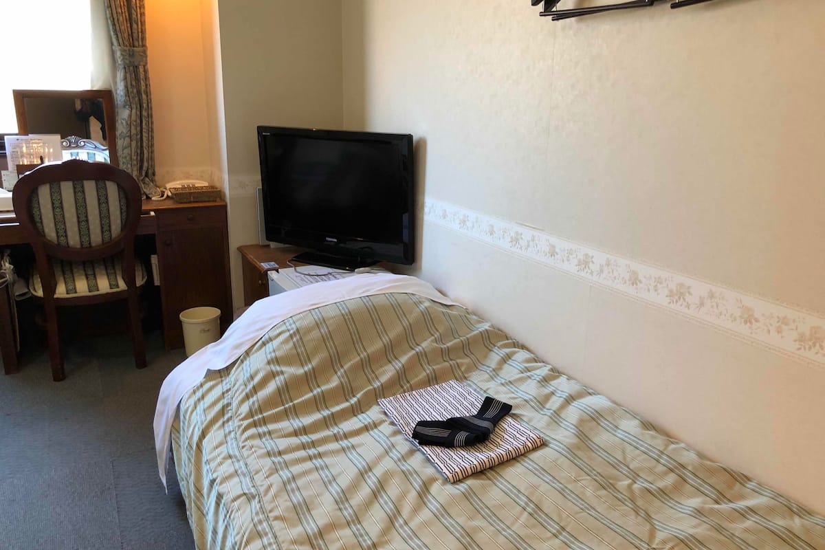 blackout curtains, iron/ironing board, free wifi, bed sheets