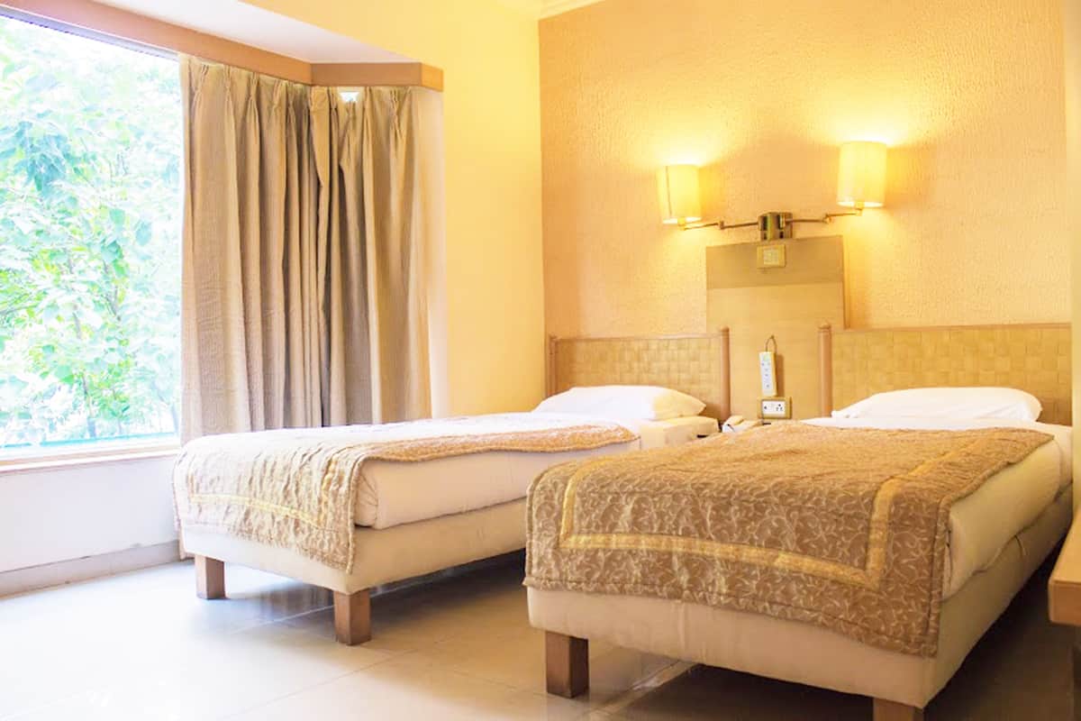 Deluxe Twin Room, City View | In-room safe, desk, rollaway beds, free WiFi