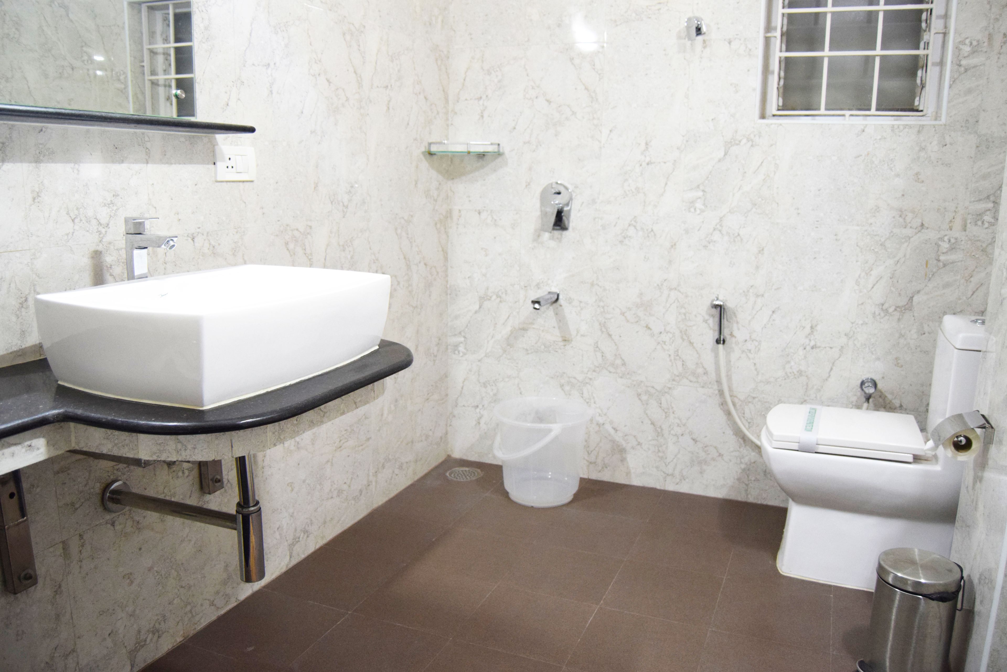 premium triple room | bathroom | free toiletries, hair dryer, towels