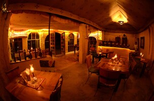 Breakfast and dinner served, local cuisine