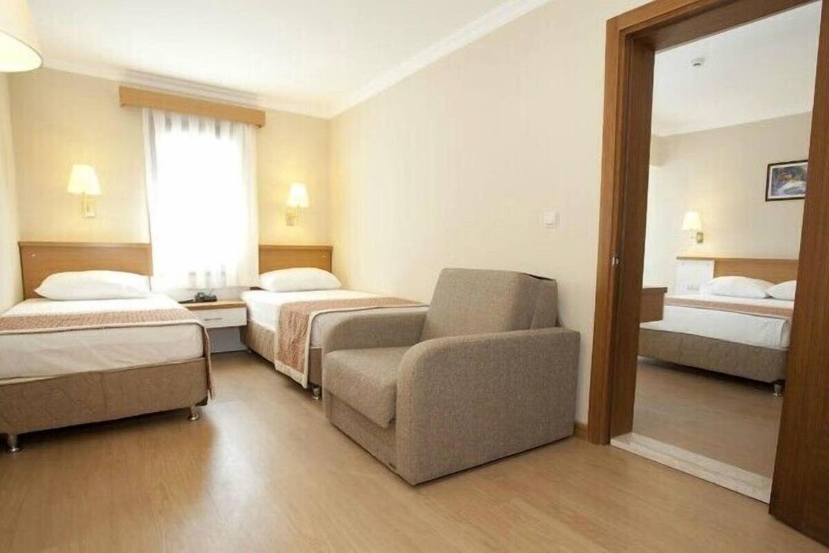 Family Double or Twin Room | Minibar, in-room safe, free rollaway beds, free WiFi