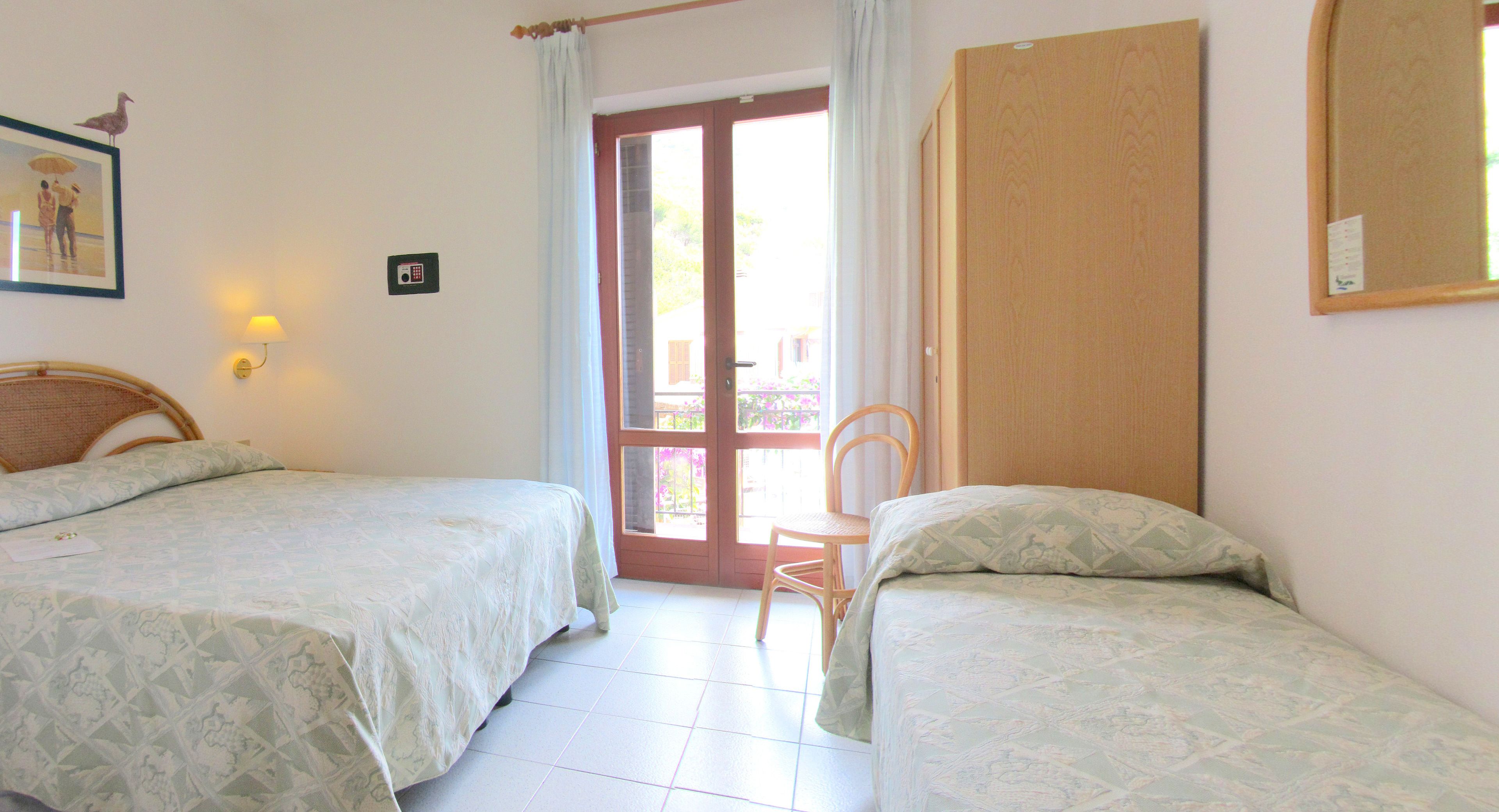 standard double or twin room (with extra bed) | bathroom | shower, hair dryer, bidet, towels