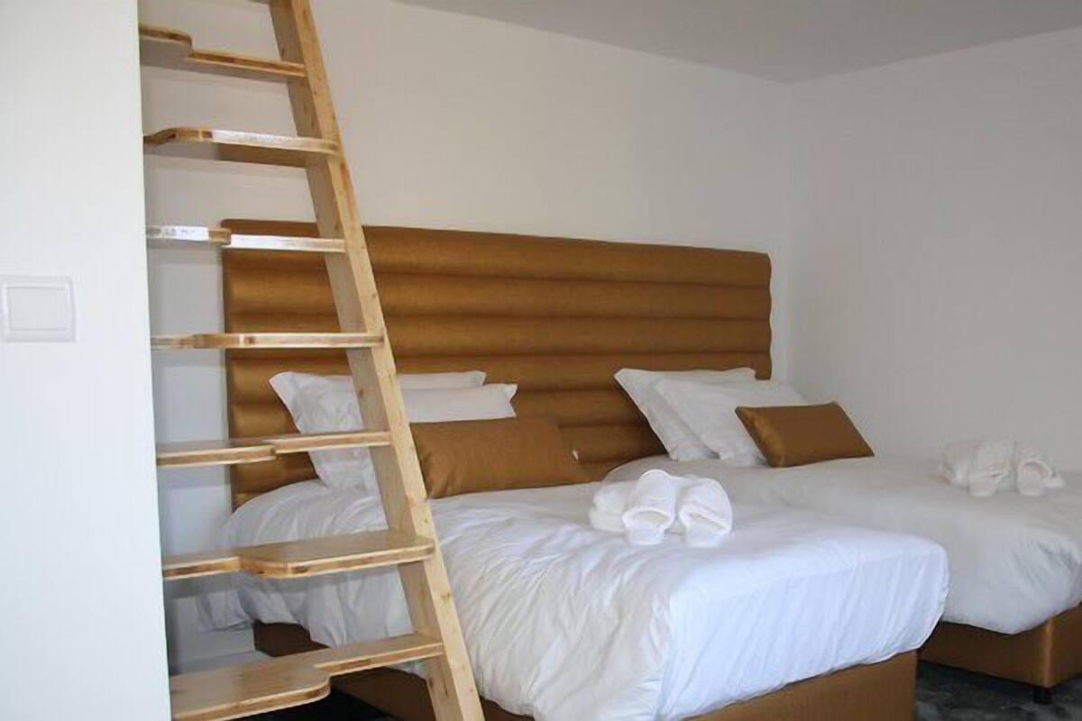 Deluxe Double or Twin Room | Minibar, desk, blackout curtains, soundproofing
