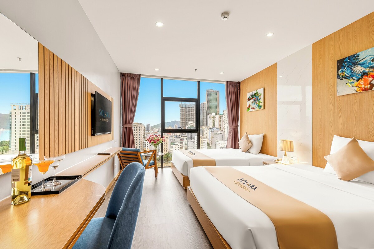 Family Suite, Partial Sea View | Minibar, in-room safe, desk, WiFi (free)