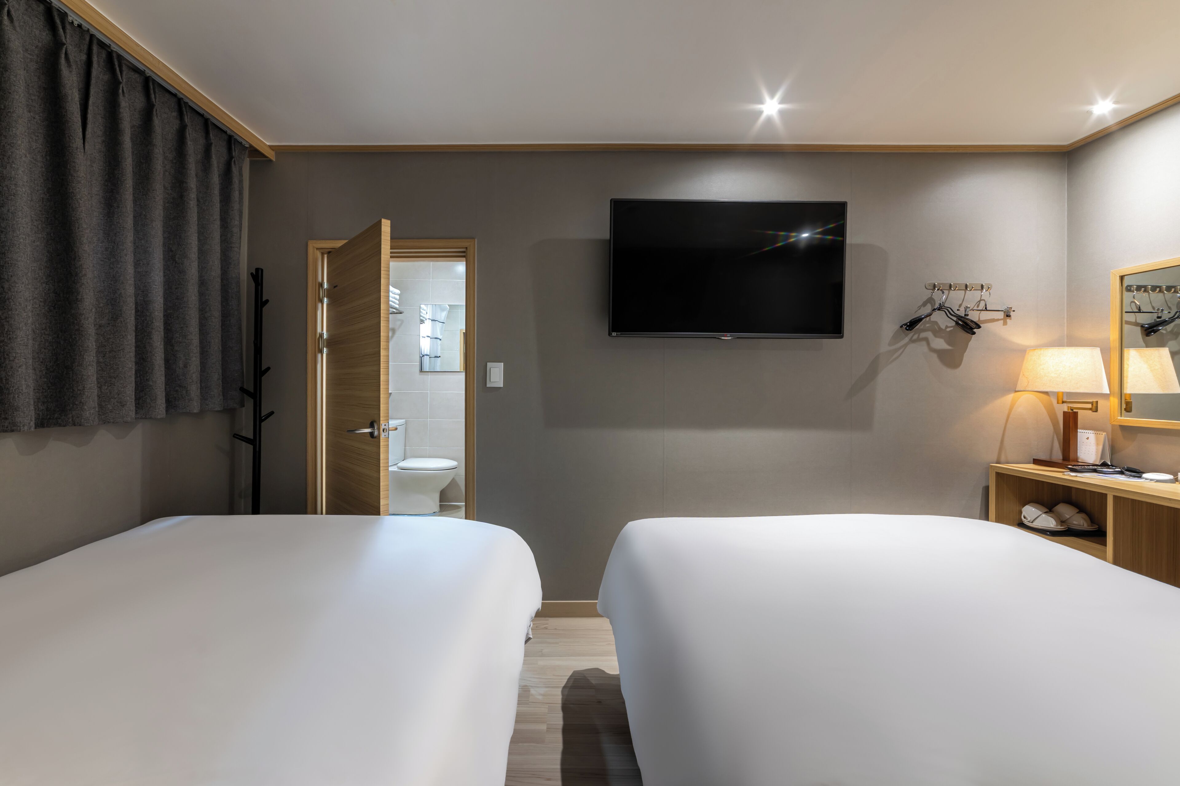 Family Twin Room | In-room safe, desk, blackout curtains, iron/ironing board