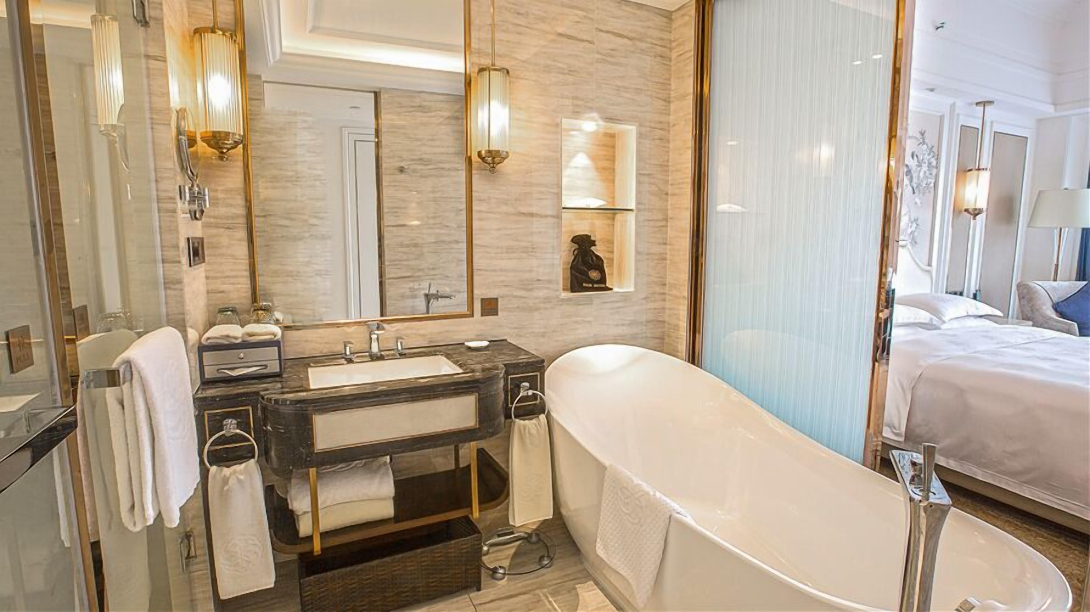 business room, 1 king bed, garden view | bathroom | designer toiletries, hair dryer, bathrobes, slippers