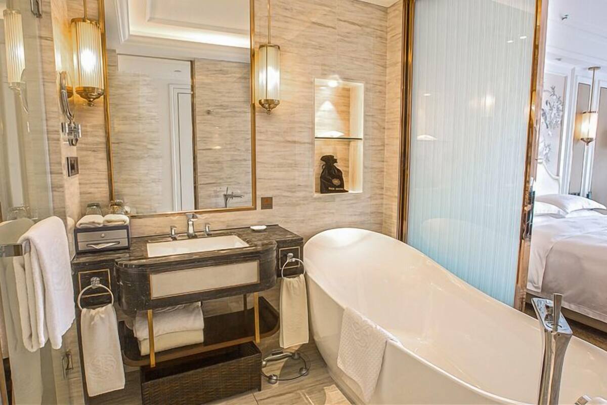 business room, 1 king bed, garden view | bathroom | designer toiletries, hair dryer, bathrobes, slippers