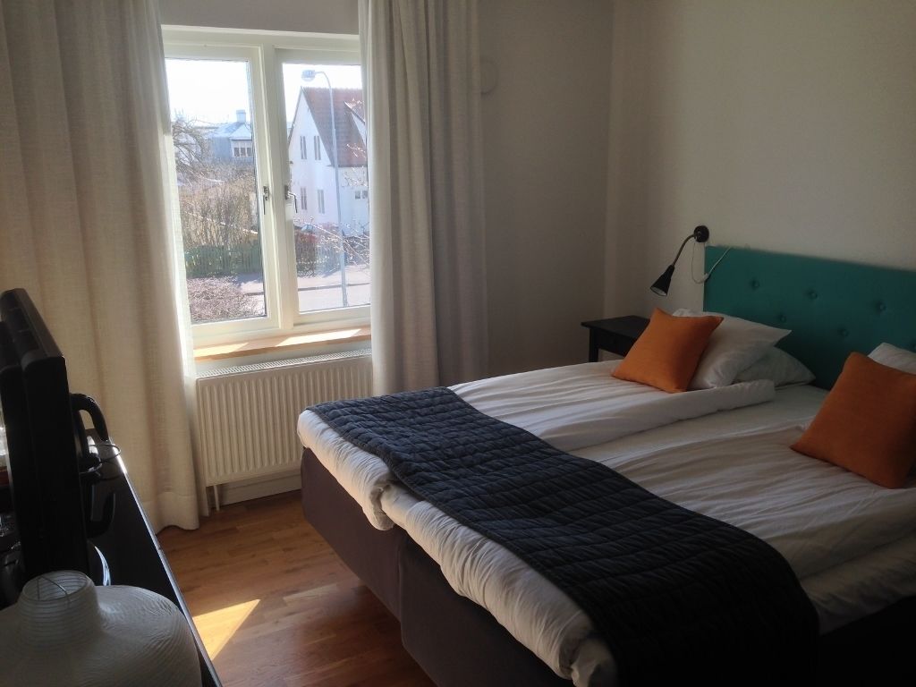 premium bedding, blackout curtains, iron/ironing board, travel cot