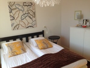 Double Room | Premium bedding, blackout drapes, iron/ironing board, travel crib