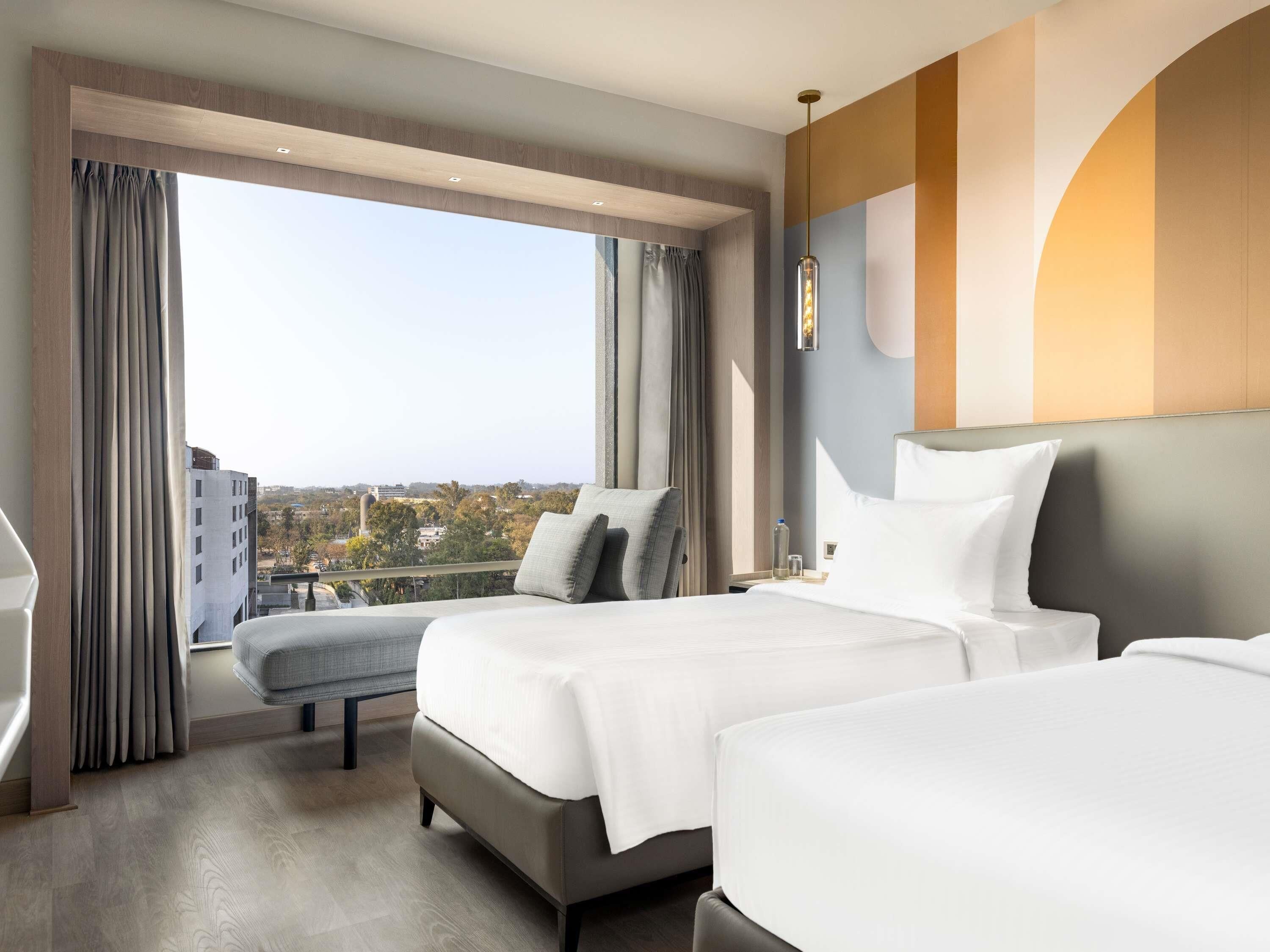 Klassieke kamer, 2 eenpersoonsbedden | Een minibar, een kluis op de kamer, een bureau, een laptopwerkplek