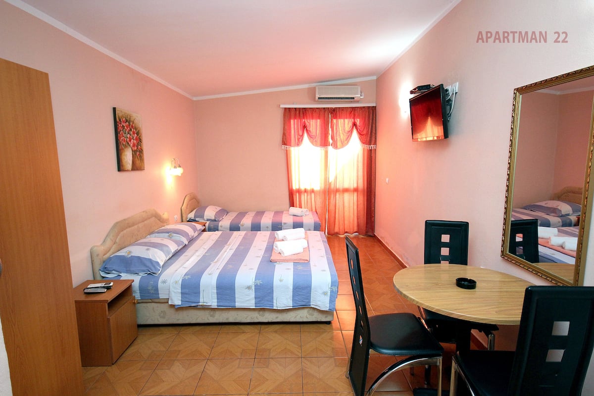 Studio, Balcony, Sea View (3 Persons) | Living area | Flat-screen TV