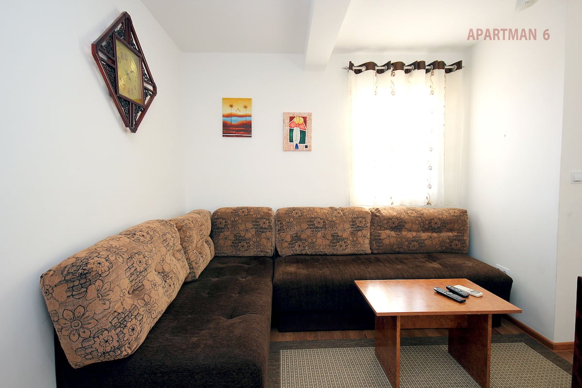 Apartment, 1 Bedroom, Balcony | Living area | Flat-screen TV