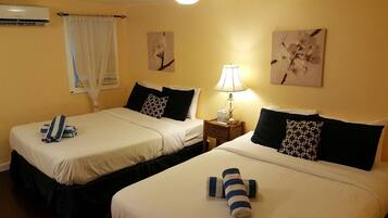 Deluxe Room 2 Queen at Wicker House, 913 Duval Street | 1 bedroom, individually decorated, individually furnished