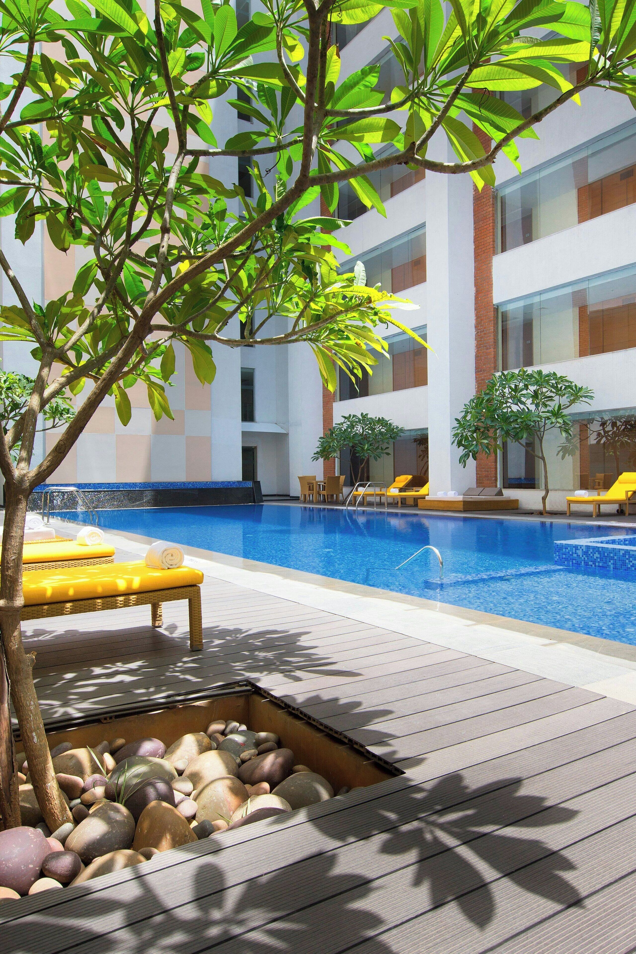 2 outdoor pools, pool umbrellas, pool loungers