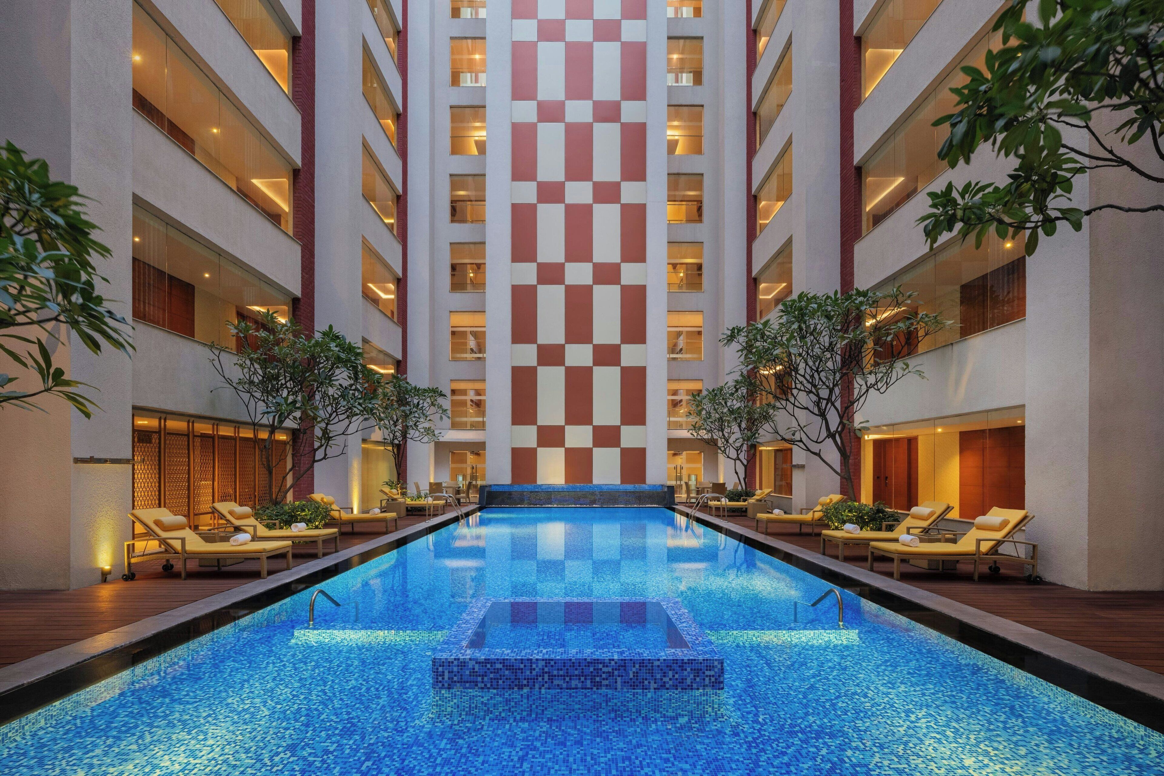 2 outdoor pools, pool umbrellas, pool loungers