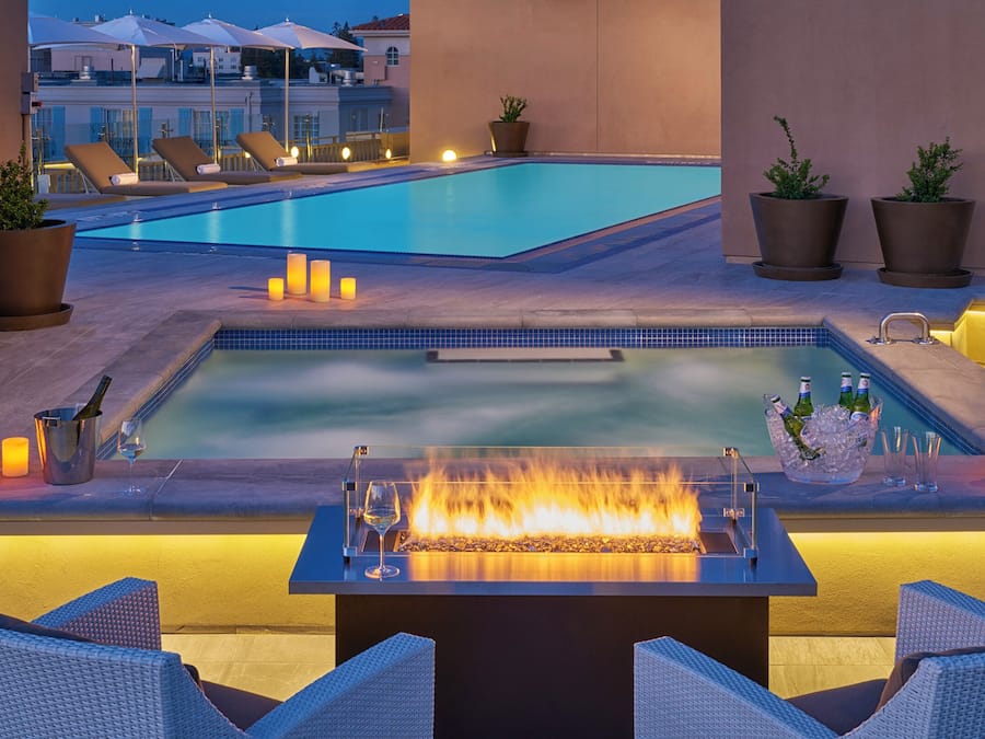 Outdoor pool, open 6:00 AM to 11:00 PM, free cabanas, pool umbrellas