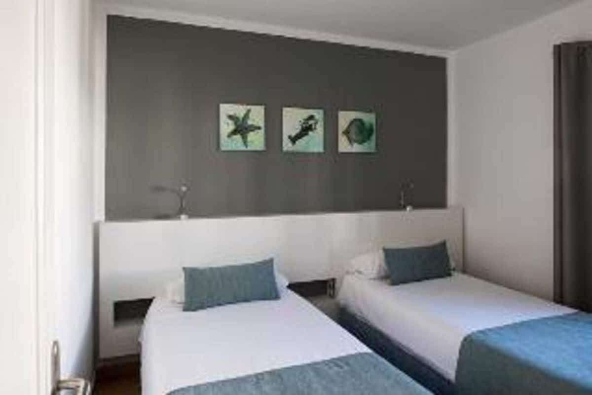 1 habitación, escritorio, wifi gratis y ropa de cama