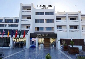 A modern building with the name 'Hamilton Agadir' prominently displayed. - HAMILTON Agadir (Agadir)