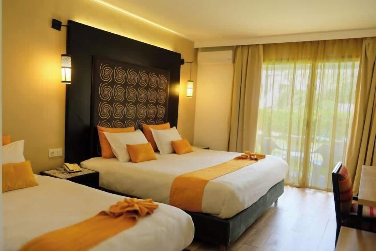 Minibar, desk, laptop workspace, blackout curtains