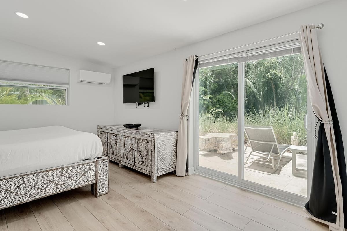 Premium House | Premium bedding, in-room safe, blackout drapes, iron/ironing board