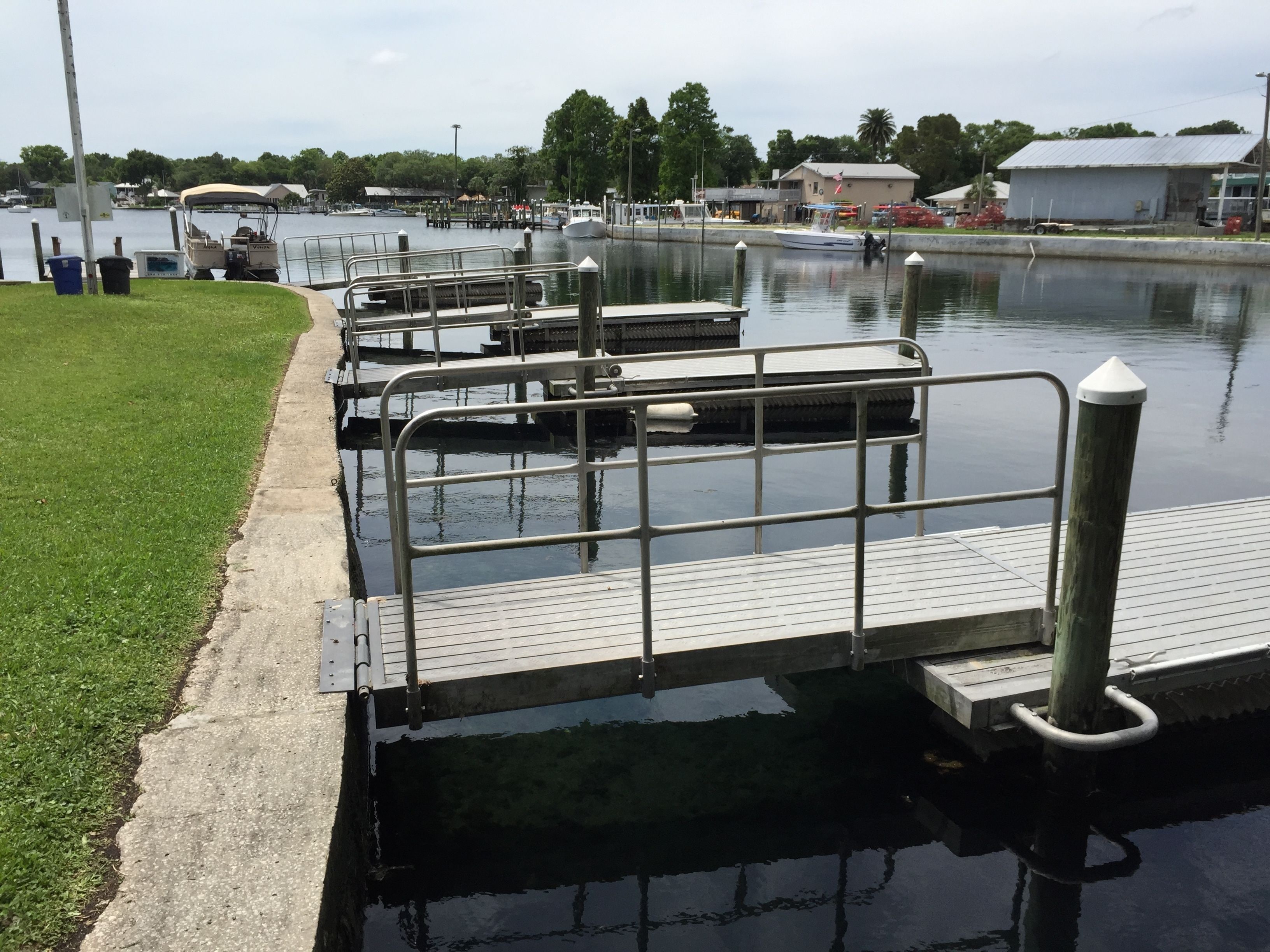 A marina with multiple docks and boats.
