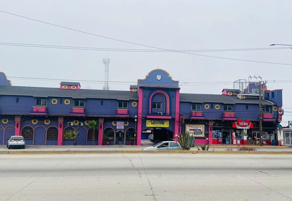 A multi-story building with a mix of commercial and residential spaces. - Hotel Baja del Sol Inn (Playas de Rosarito)